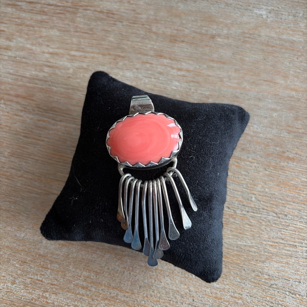 Vintage sterling silver fob with large oval coral stone in Center